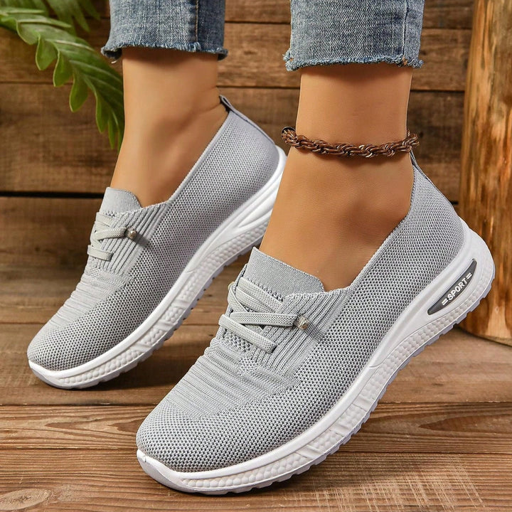 Chaussures plates femme, design respirant, semelle amortissante pour pieds sensibles, soulageant fasciite plantaire.