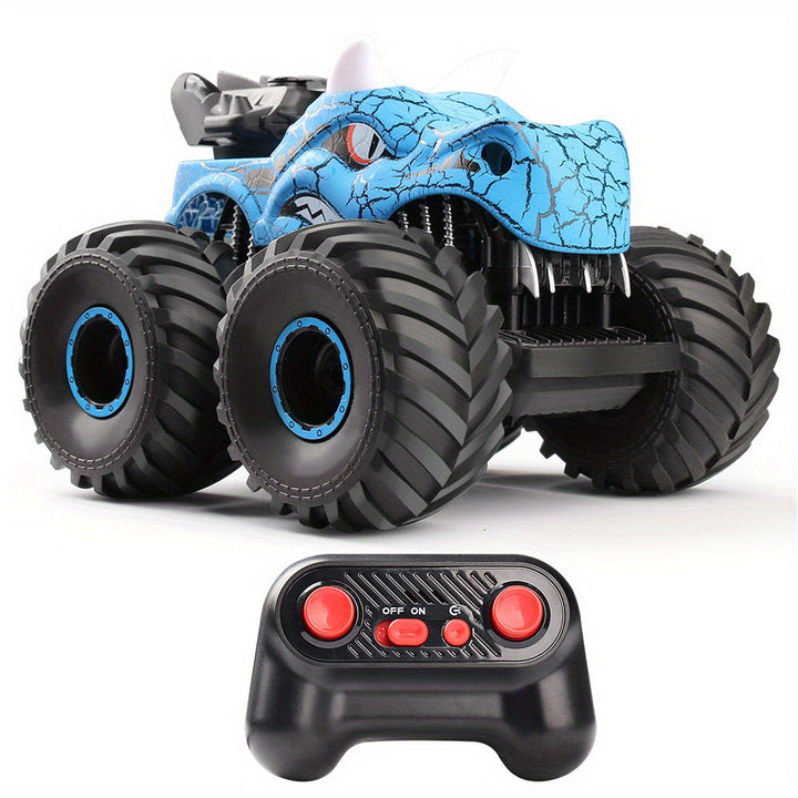 Monstertruck DinoBlaze rouge et bleu, voiture cascade télécommandée tout-terrain avec lumières et fumée. Cadeau enfant.