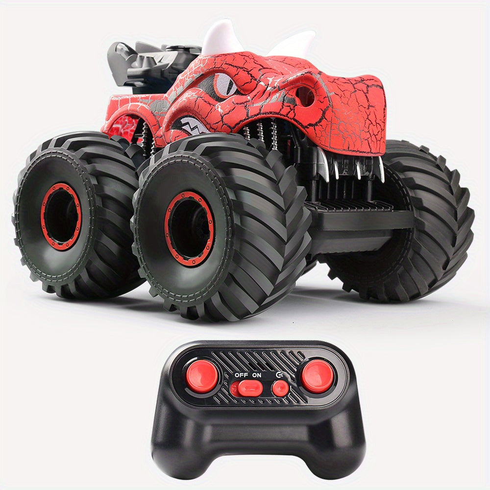 Monstertruck RC DinoBlaze rouge en pleine cascade, avec fumée, lumières LED. Véhicule tout-terrain télécommandé puissant.