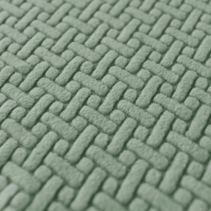 Housse de canapé jacquard extensible grise. Ameublement moderne, parfaite pour la protection du salon.