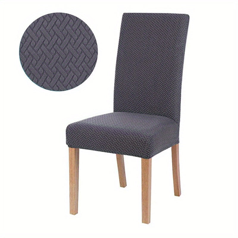 Housse de canapé jacquard grise, extensible. Apporte confort et protection élégante à votre salon moderne.