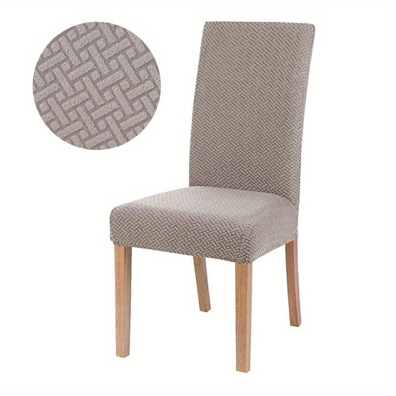 Housse de chaise élastique à motifs. Offre une protection maximale et une décoration chic à votre salle à manger.