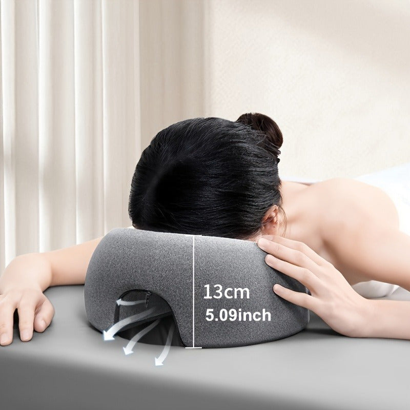 Coussin de visage U-forme ergonomique, confort optimal pour relaxation et soins en salon ou spa.