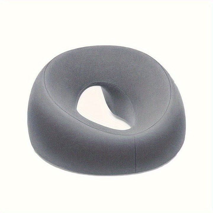 Coussin visage U-forme ergonomique et lavable, confort supérieur pour détente et soins en salon.