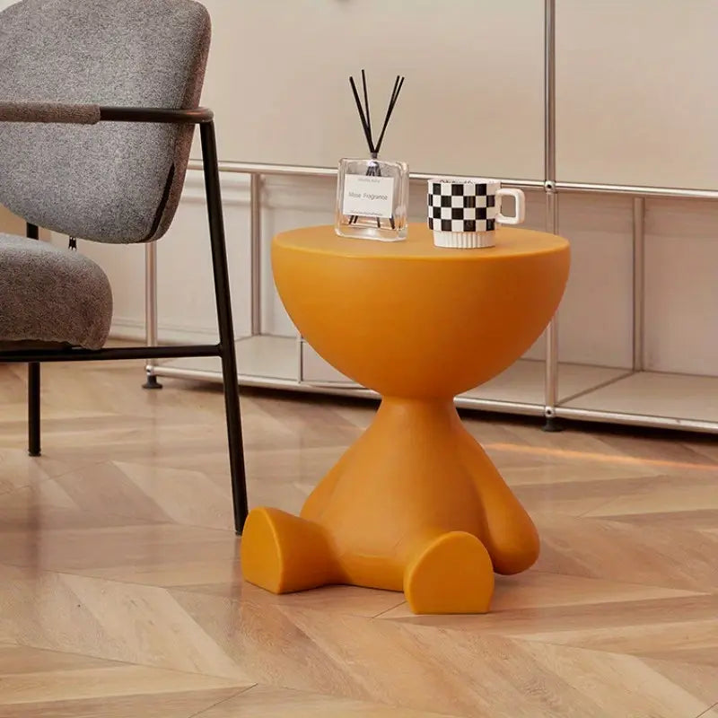 Table de salon minimaliste design scandinave ScandiNest, en plastique PE, légère et facile à déplacer.