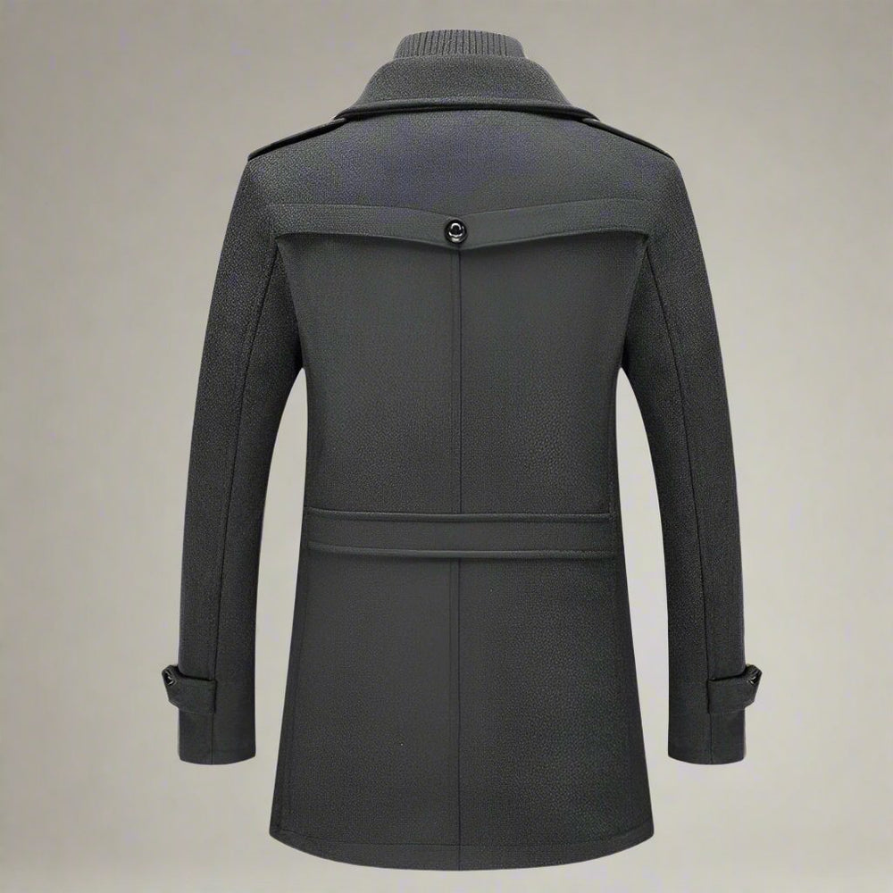 Veste hiver homme élégante, coupe longue, col doublé, tissu chaud. Fermeture éclair discrète.