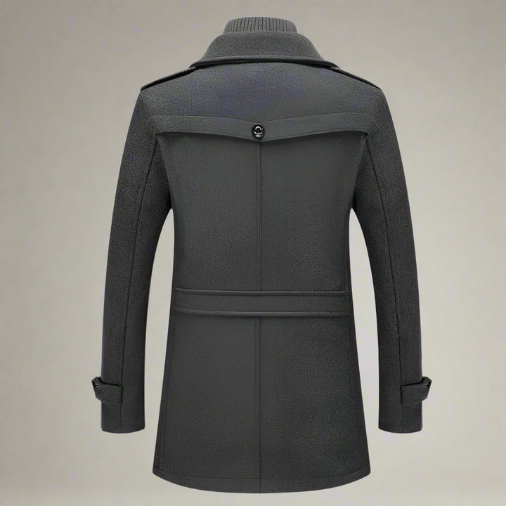 Veste hiver homme élégante, coupe longue, col doublé, tissu chaud. Fermeture éclair discrète.