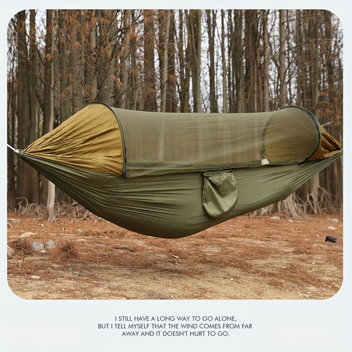 Hamac de voyage avec filet anti-moustique intégré pour des nuits paisibles en extérieur.
