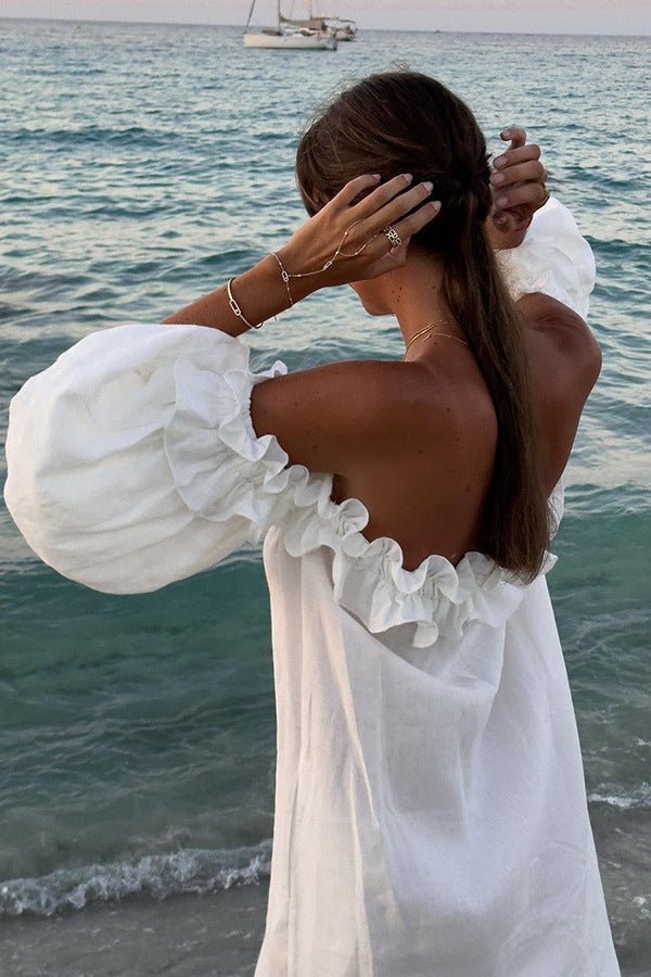Robe longue femme style Bardot, épaules dénudées, tissu léger et fluide. Idéale pour plage et vacances.