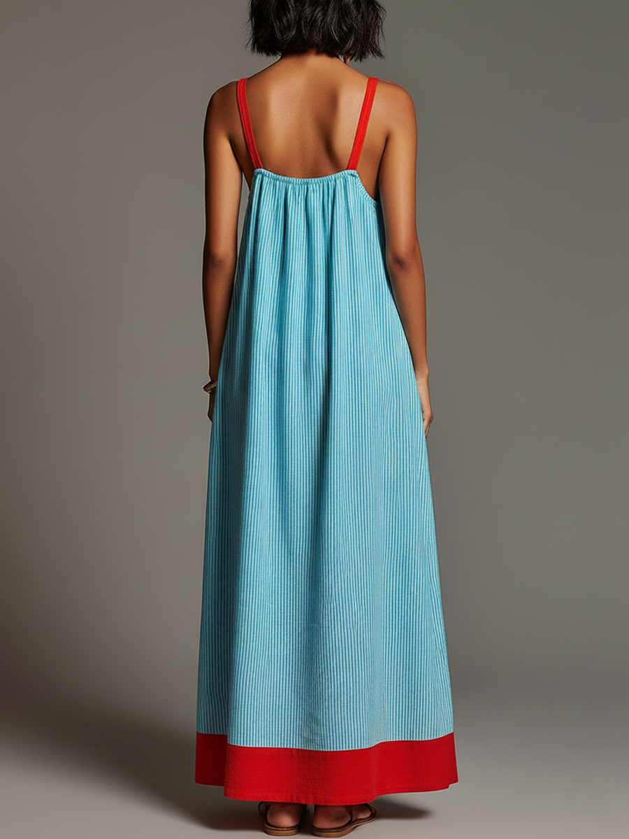 Robe longue femme estivale rayée avec poches, bretelles fines. Parfaite pour les vacances et le confort d'été.