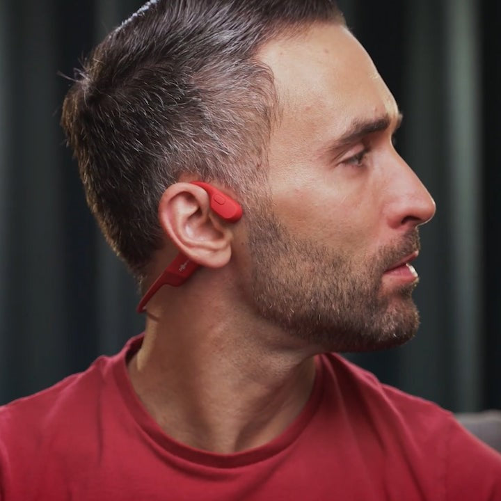 Casque audio ouvert sans fil Bluetooth pour sportifs, offrant son immersif et sécurité auditive.