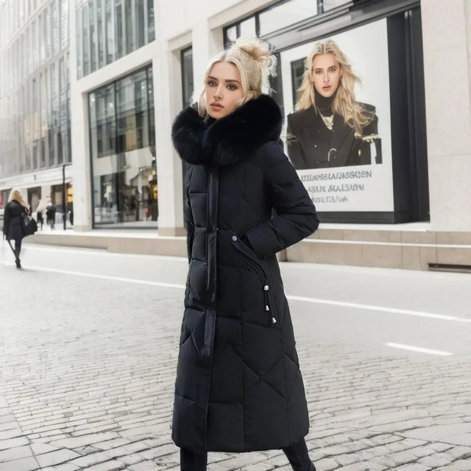 Veste longue matelassée femme polyvalente, avec capuche, idéale pour un hiver chaud et stylé.