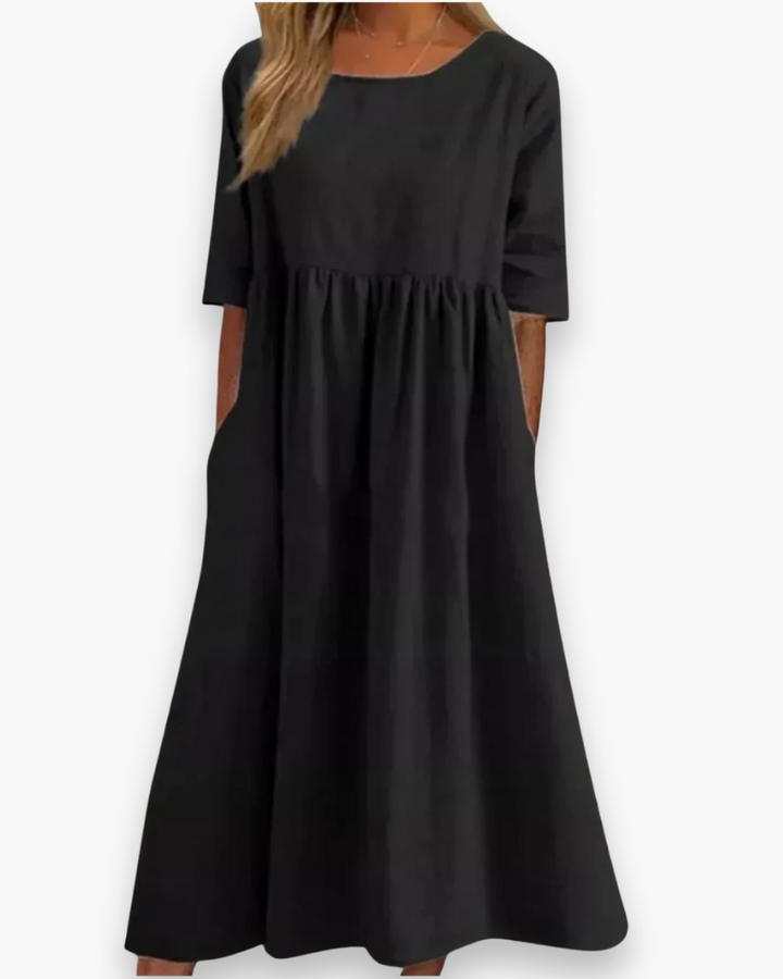 Robe midi femme élégante et confortable, idéale pour les journées de printemps et d'été.