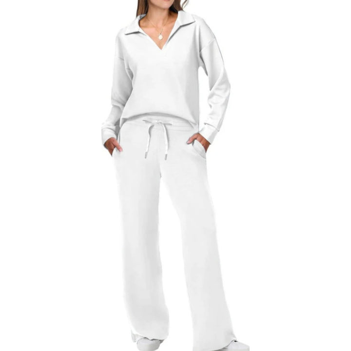 Ensemble femme chic et confortable. Deux pièces décontractées col V avec haut et pantalon pour mode casual.