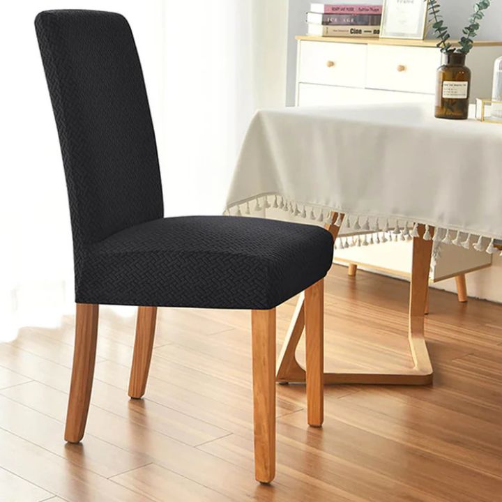 Housse de chaise élastique grise pour un relooking rapide et efficace. Imperméable, protège contre l'usure.