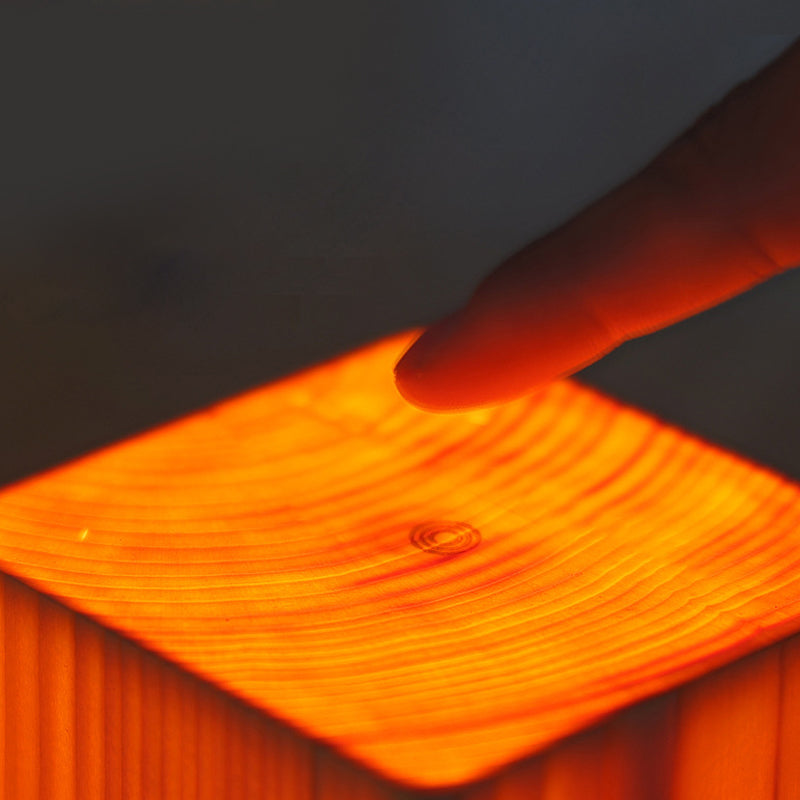 Élégante lampe de table LED portable tactile, sans fil rechargeable, parfaite pour décoration intérieure.