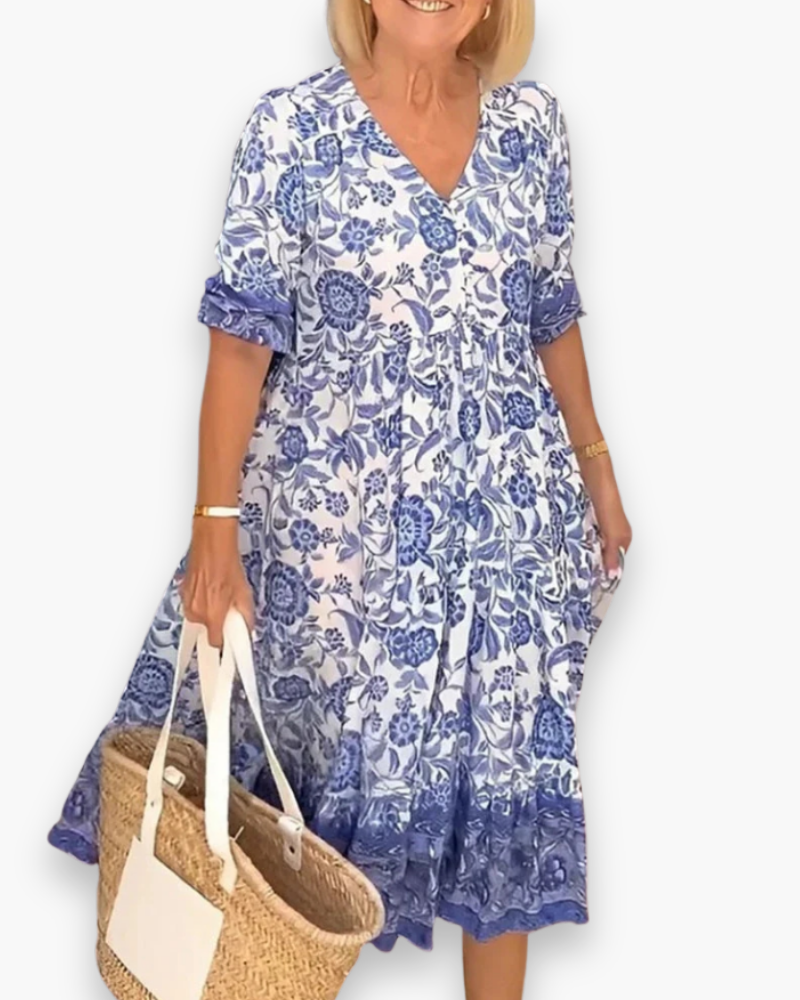 Robe fleurie midi femme, élégante et décontractée. Idéale pour un look printemps/été tendance.