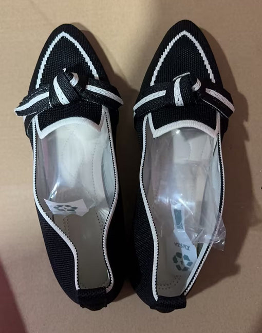 Chaussures plates femme légères et aérées, tissées pour un confort décontracté en été.