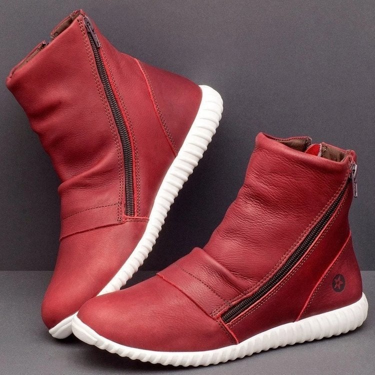 Bottes femme mi-mollet structurées, parfaites pour l'automne. Style élégant et urbain, alliant mode et stabilité.