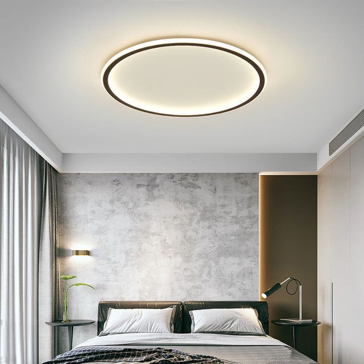 Plafonnier LED rond scandinave, éclairage minimaliste pour une ambiance moderne et épurée.