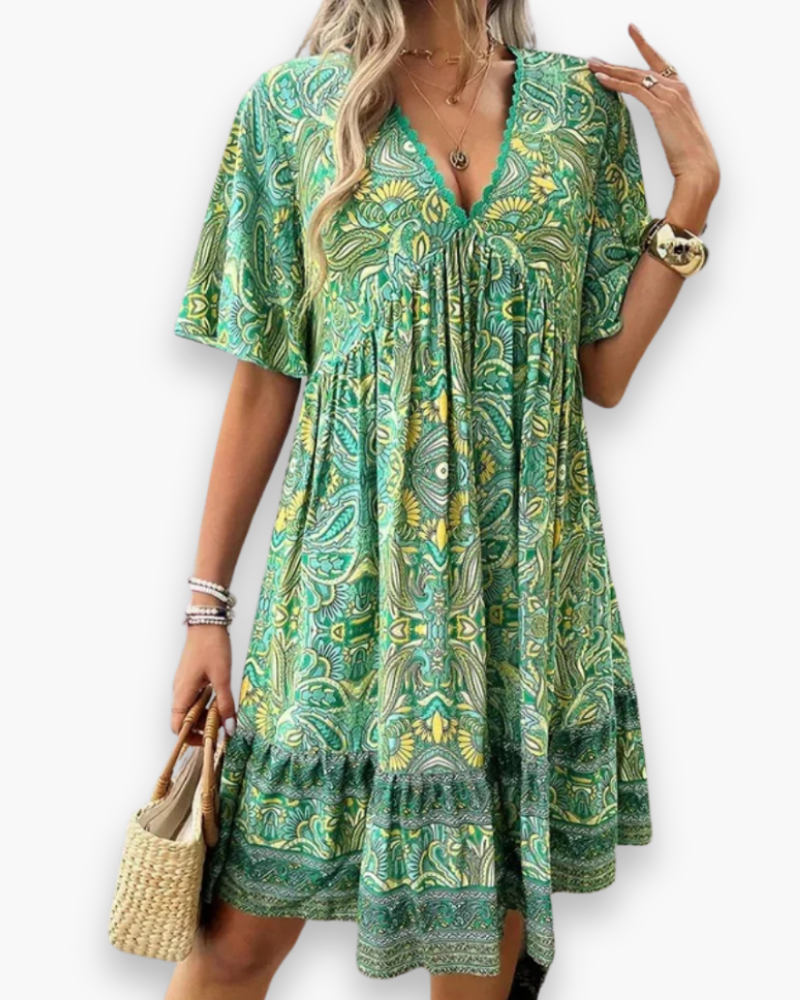 Robe midi fluide et élégante pour femme, parfaite pour l'été. Style chic et décontracté, légère et féminine.