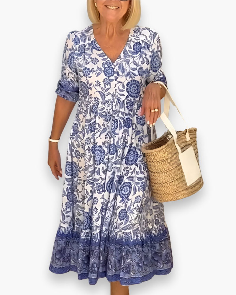 Robe midi fleurie élégante pour femme, idéale été/printemps, style chic et décontracté.