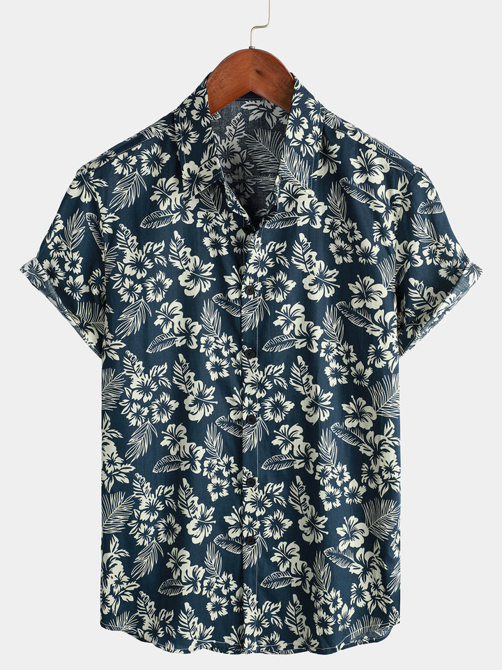 Chemise hawaïenne homme, motif hibiscus, manches courtes, idéale pour la plage d'été.