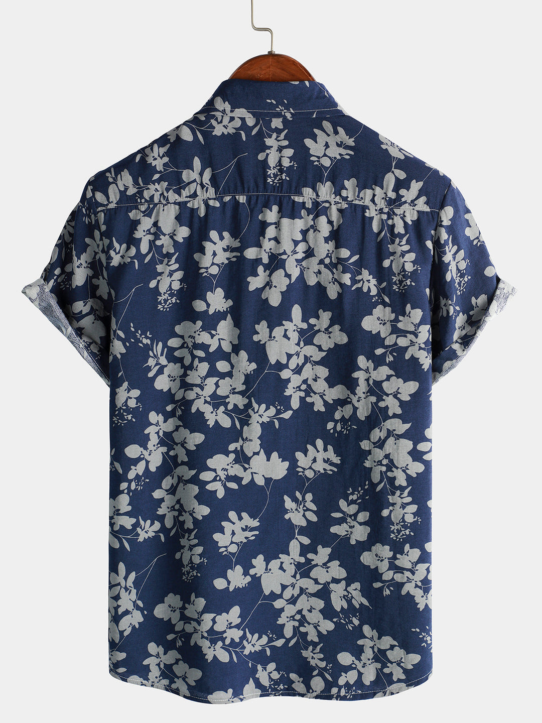 Chemise mode masculine, imprimé tropical vibrant, manches courtes, parfaite pour l'été.