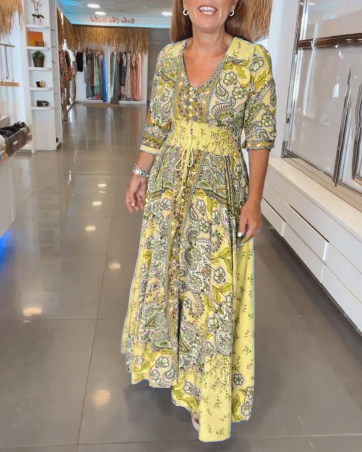 Robe maxi fluide femme, motif floral tropical, col V. Pour une silhouette élancée.