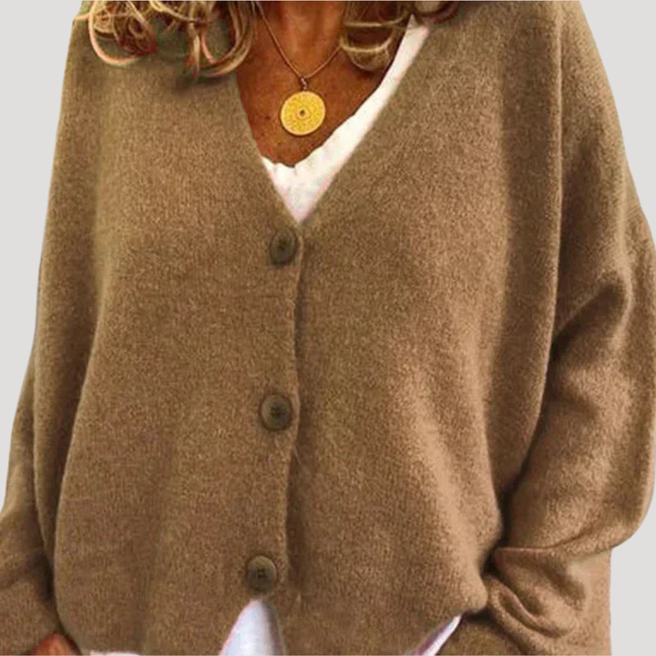 Cardigan femme décontracté boutonné, col V. Idéal automne/printemps, style polyvalent et confortable pour le quotidien.
