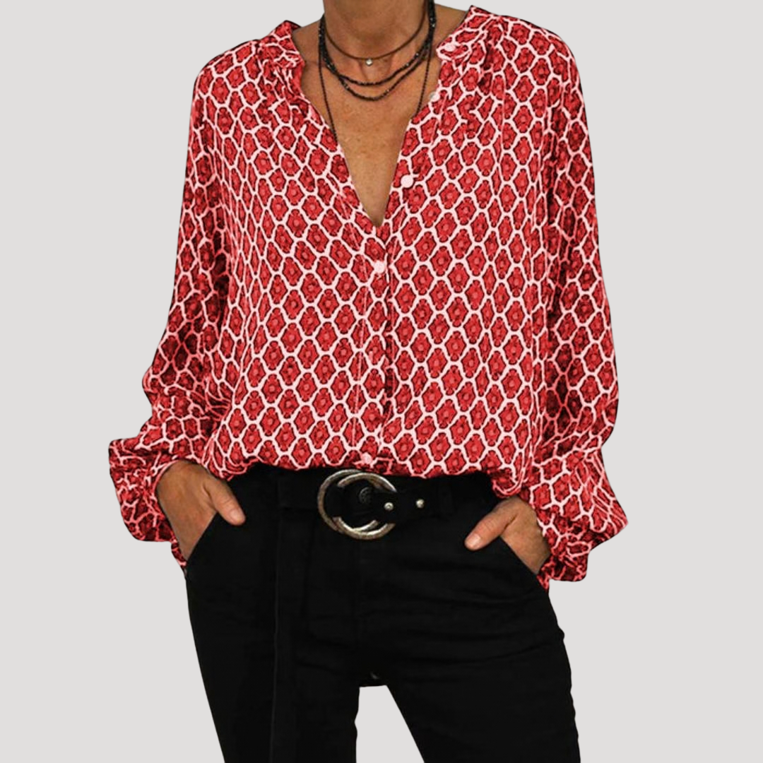 Chemisier femme élégant à motifs, col V, manches longues. Idéal pour le printemps ou l'automne, style chic mode féminine.