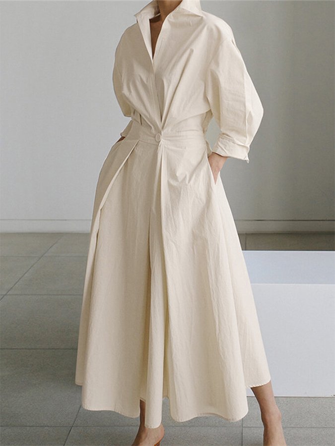Robe midi boutonnée femme, élégance intemporelle. Coupe flatteuse, parfaite pour printemps/été, mode féminine.