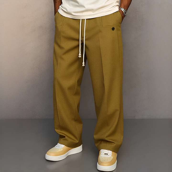 Pantalon homme décontracté gris avec cordon de serrage, idéal pour le confort et le style quotidien.