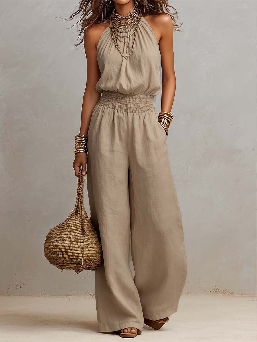 Combinaison femme fluide halter, élégante et aérienne avec ses jambes larges. Look chic d'été.