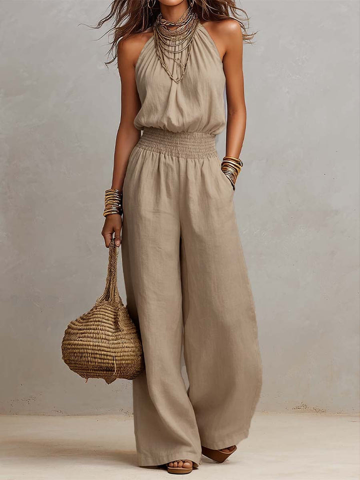 Combinaison femme fluide halter, élégante et aérienne avec ses jambes larges. Look chic d'été.