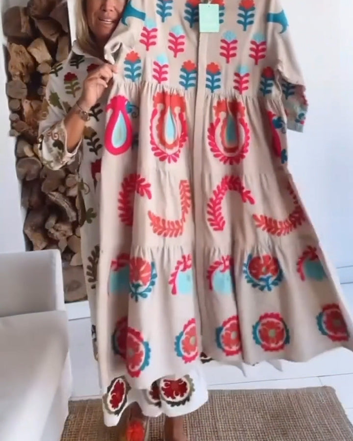 Robe femme estivale fluide, imprimé fleurs vives, longueur midi, confort décontracté élégant.