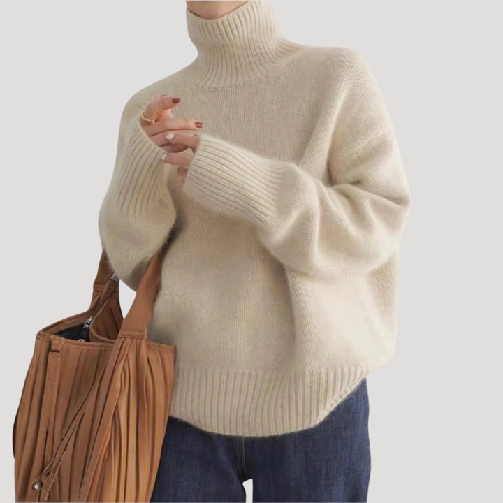 Pull col roulé femme oversize doux et chaud, coupe décontractée pour un confort hivernal optimal.