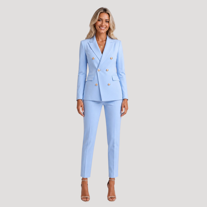 Tailleur pantalon femme croisé à double boutonnage, ensemble élégant pour tenue professionnelle chic.
