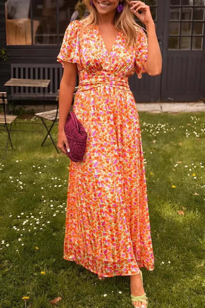 Robe fluide fleurie Elisa pour femme, élégante et décontractée, idéale pour printemps et été. Parfaite pour les vacances.