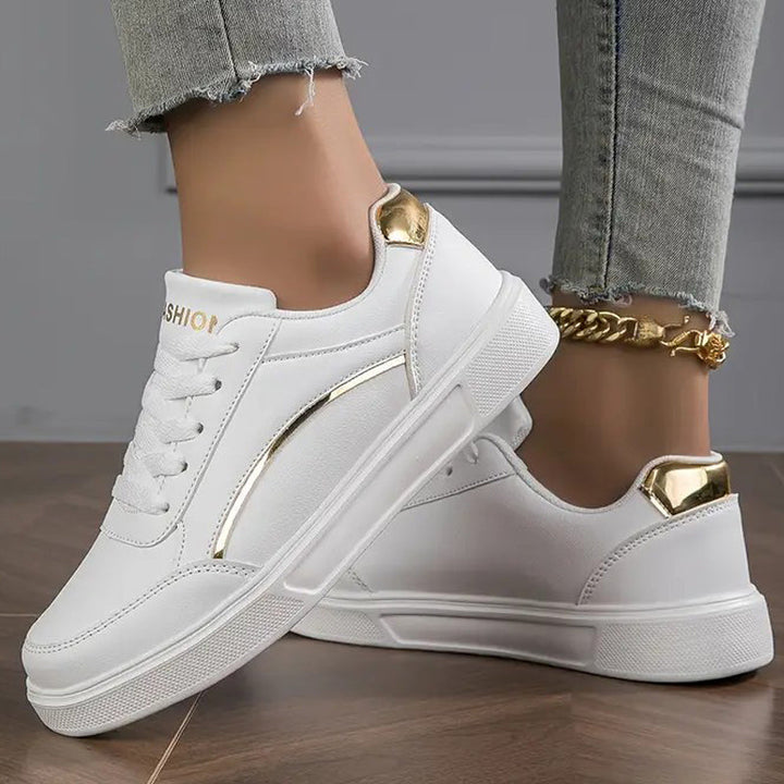 Baskets féminines blanches pour un style élégant et moderne, assurant confort et allure chic.