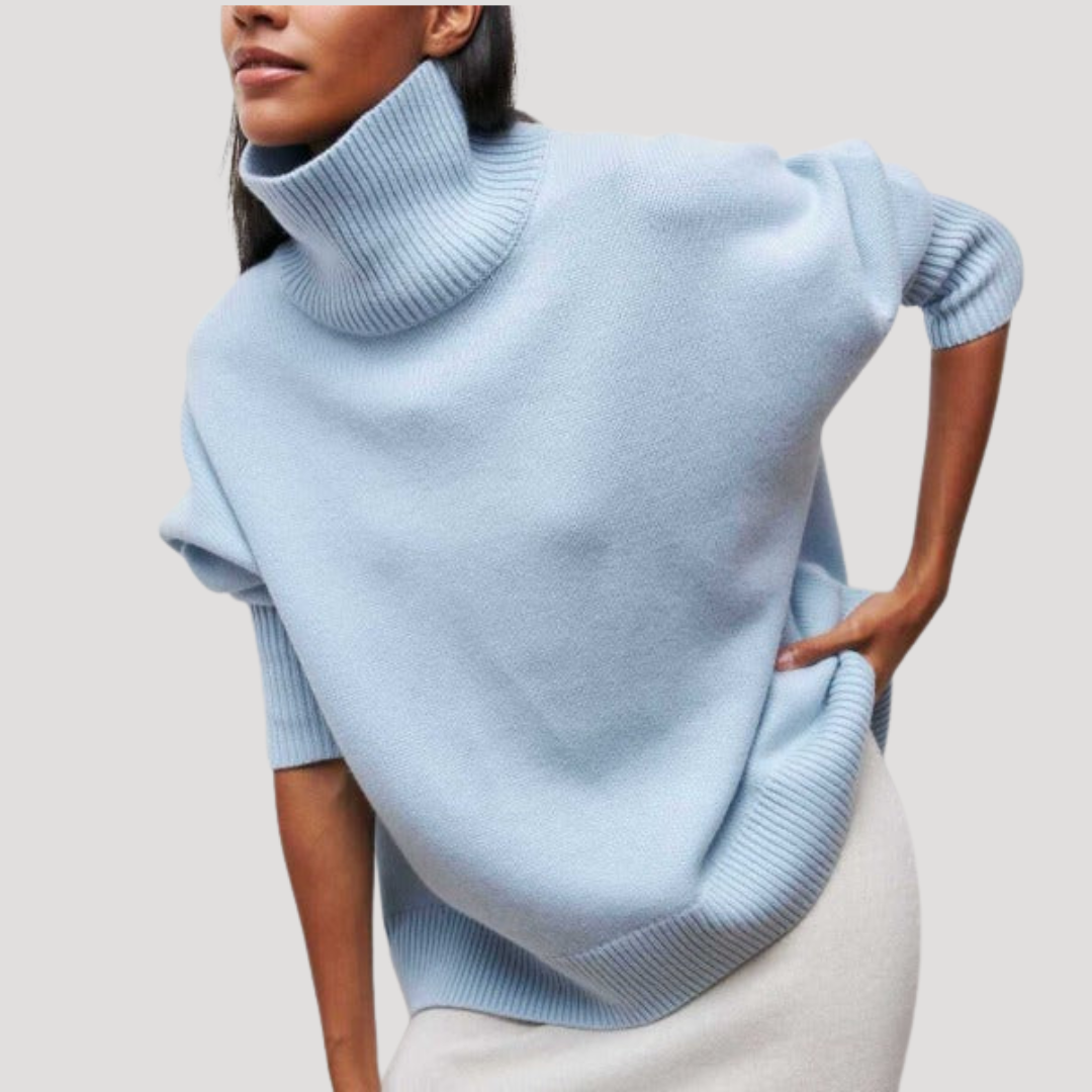 Pull oversize femme à col montant, chaud et confortable pour l'hiver. Idéal pour une mode décontractée.