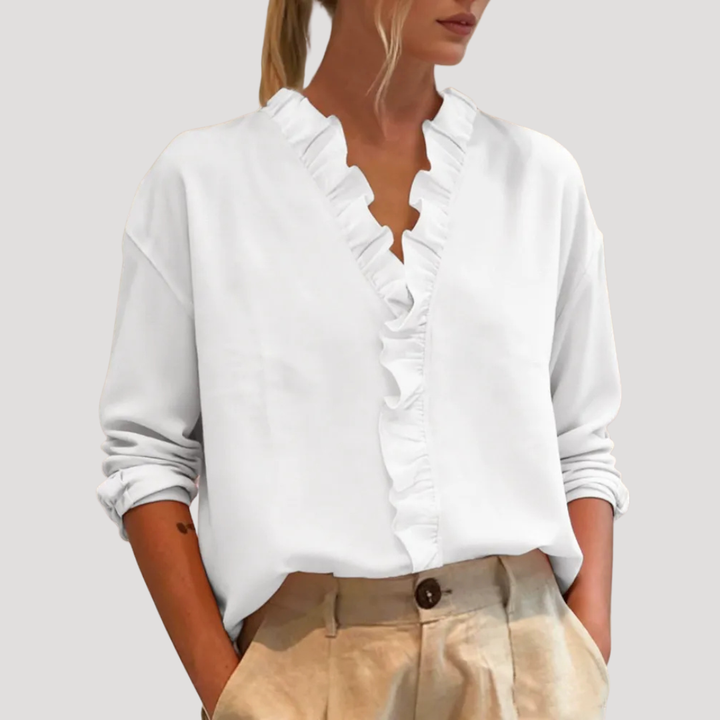 Blouse femme élégante à volants, manches longues fluides. Parfaite pour le printemps/automne, look chic et polyvalent.