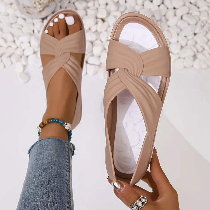 Chaussures plates d'été pour femmes, avec nœuds, alliant confort et élégance.