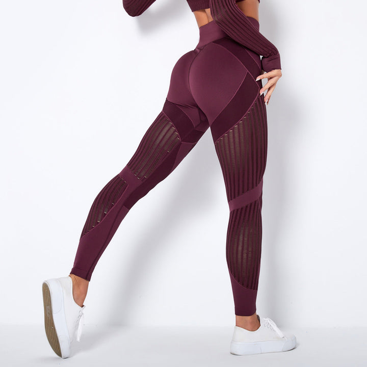 Pantalon legging femme taille haute noir, offrant maintien et flexibilité pour les activités sportives et le quotidien.