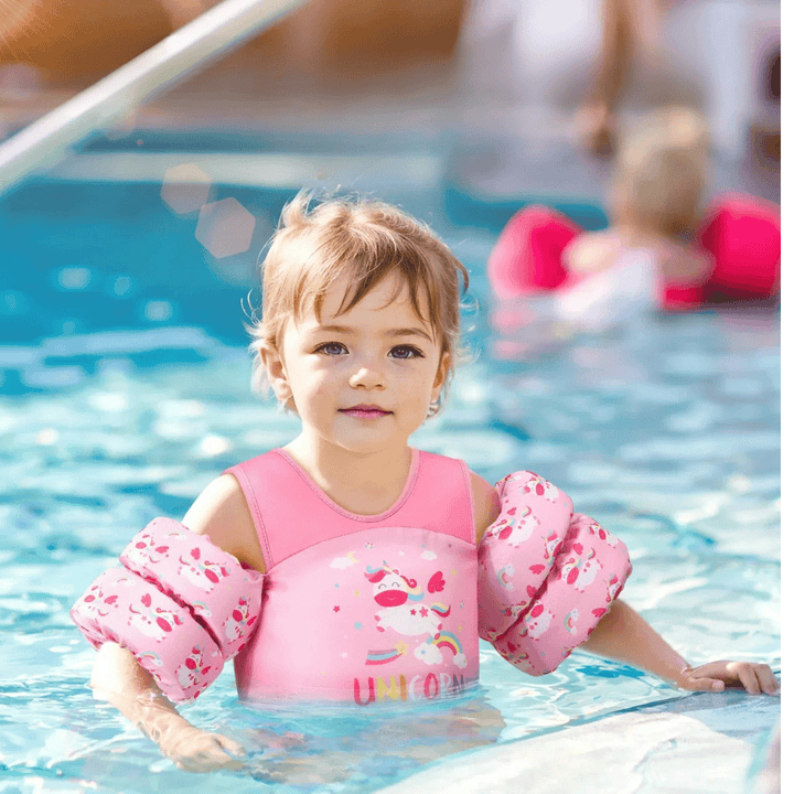 Gilet de flottaison enfant avec brassards intégrés, sécurité natation piscine et plage. Idéal pour l'été.