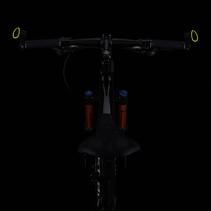 Poignées de guidon vélo noires ergonomiques, prise en main sûre et anti-douleur pour tous cyclistes.