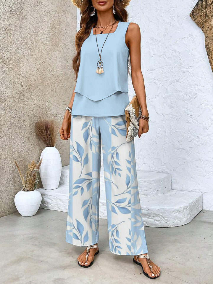 Ensemble femme floral Ghislaine, haut fleuri & pantalon confortable. Tenue chic et élégante pour l'été.