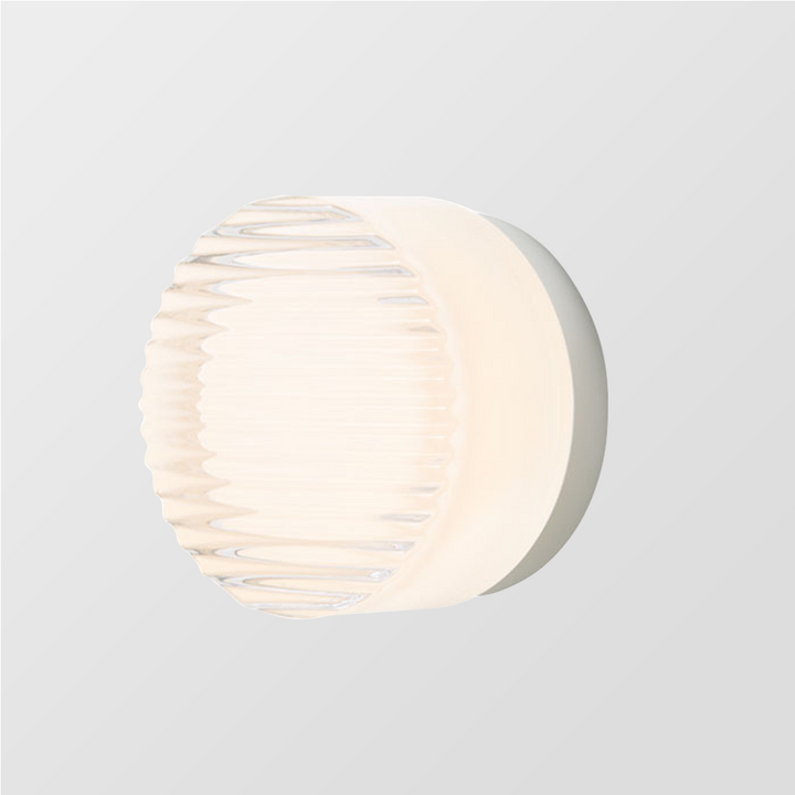 Design d'applique LED économe en énergie pour mur intérieur, ambiance lumineuse moderne et stylée.
