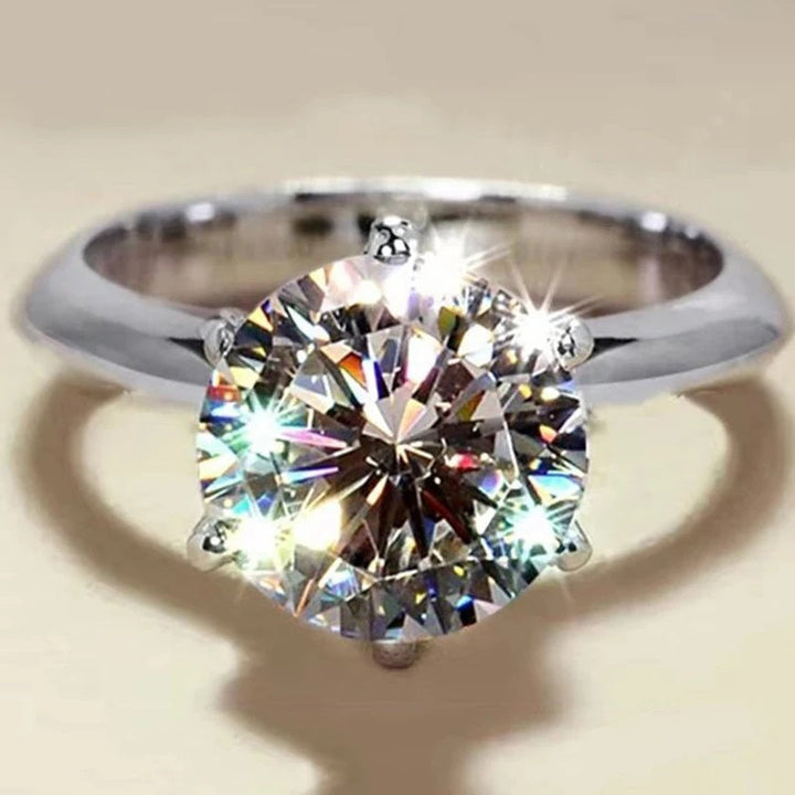 Superbe bague de fiançailles moissanite ronde certifiée GRA, cadeau parfait pour femme.