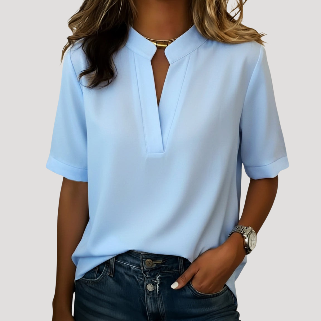 Blouse chic femme à col V, manches courtes, fluide. Idéale pour un look élégant et décontracté en été.